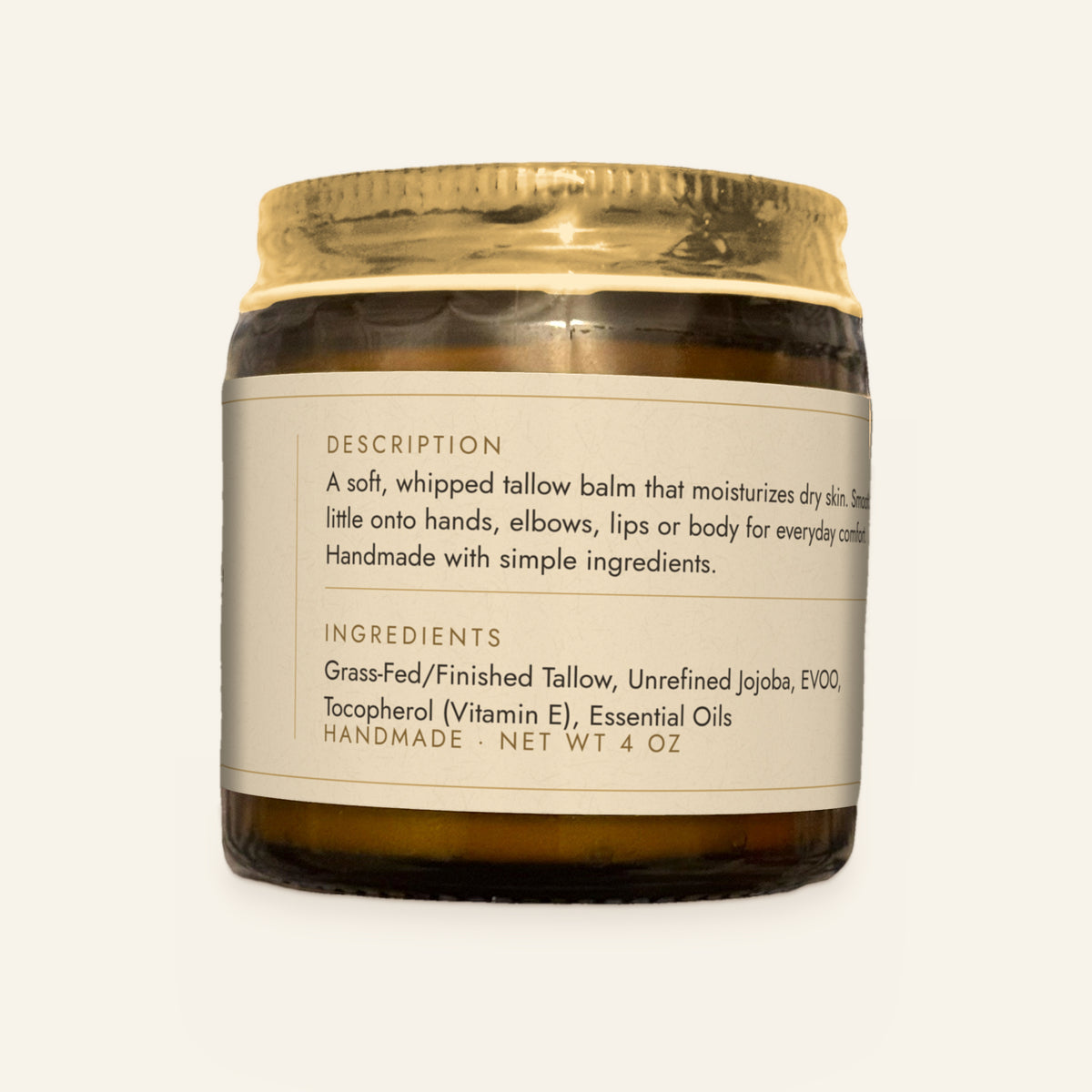 Tallow Roots Co. Lavender Tallow Glow whipped tallow balm in a glass jar with gold lid, cream label description and ingredients panel facing the camera, plain cream background